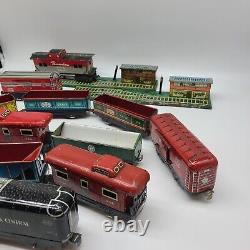 Lot of 12 Vintage Marx Tin Trains And 2 Train Stations