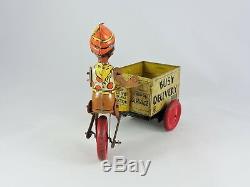 Marx BUSY DELIVERY Wind-up Tin Toy Black Pinocchio 1930s vintage bike cycle cart
