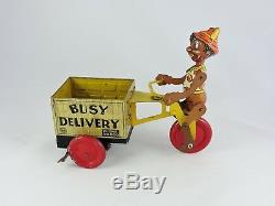 Marx BUSY DELIVERY Wind-up Tin Toy Black Pinocchio 1930s vintage bike cycle cart