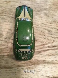 Marx Tricky Taxi Wind Up Tin Toy Green Tin Wind Up Vintage Toy & Police Car