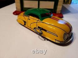 VERY NICE VINTAGE 1950S MARX TIN LITHO MAGIC GARAGE with WIND UP CAR with BOX