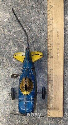 Vintage 1930's Marx roll-over 5 plane #12. Tin wind-up stunt airplane