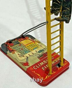 Vintage 1930s MARX Toys Climbing Fireman Wind Up Tin Metal Toy