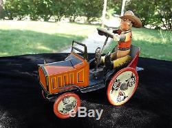 Vintage 1930s tin litho wind up toy Whoopee Cowboy Crazy Car Jelopy by Marx USA