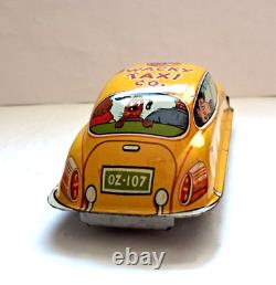 Vintage 1940's Marx Friction Wacky Taxi Tin Toy Car