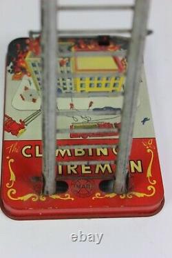 Vintage 1949 Louis Marx Tin Wind-Up Climbing Fireman Works Perfectly NICE