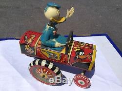 Vintage 1950's Line Mar Donald Duck Dipsy Car Tin Windup with Bobble head