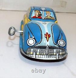 Vintage 1950's Marx Family Woody Station Wagon Windup Tin Toy Car