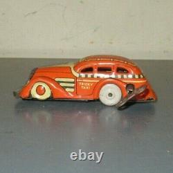 Vintage 30's/40's Marx Tin Litho Wind Up Orange & White Tricky Taxi Works
