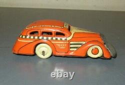 Vintage 30's/40's Marx Tin Litho Wind Up Orange & White Tricky Taxi Works