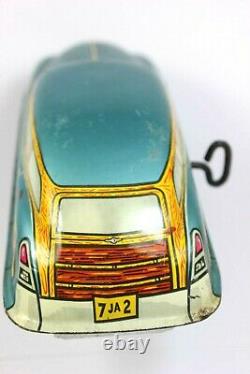 Vintage 40's MARX Tin Litho Wind-Up WOODY Blue Family Sedan Runs Good