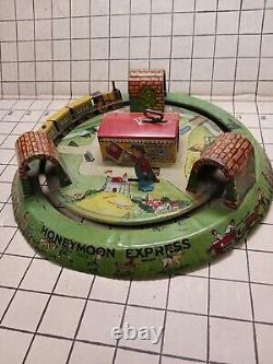 Vintage MARX Honeymoon Express Tin Litho Wind-up Toy with Flag Man + Steam Train