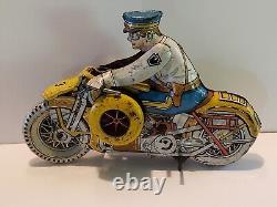 Vintage MARX Wind-up Tin Police Motorcycle