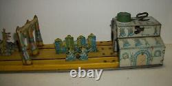 Vintage Marx THE BIG PARADE wind up tin litho 24 long good shape works good