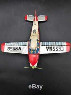 Vintage Marx Tin Litho Hanger and Vintage Tin Friction Cessna Airplane