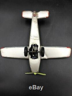 Vintage Marx Tin Litho Hanger and Vintage Tin Friction Cessna Airplane