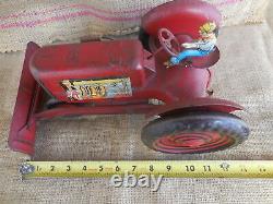 Vintage Marx Tin Lithograph Toy Tractor with scrape and original driver