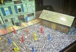 Vintage Tin Litho Marx Western Town, Hotel, and Cabin Playset with figures