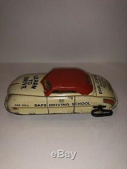 Vintage Tin Lithograph Driving School Wind-Up Car made by the Marx Toy Company