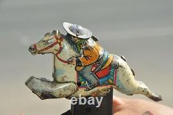 Vintage Wind Up Jumping Horse Rider Litho Tin Toy, Japan